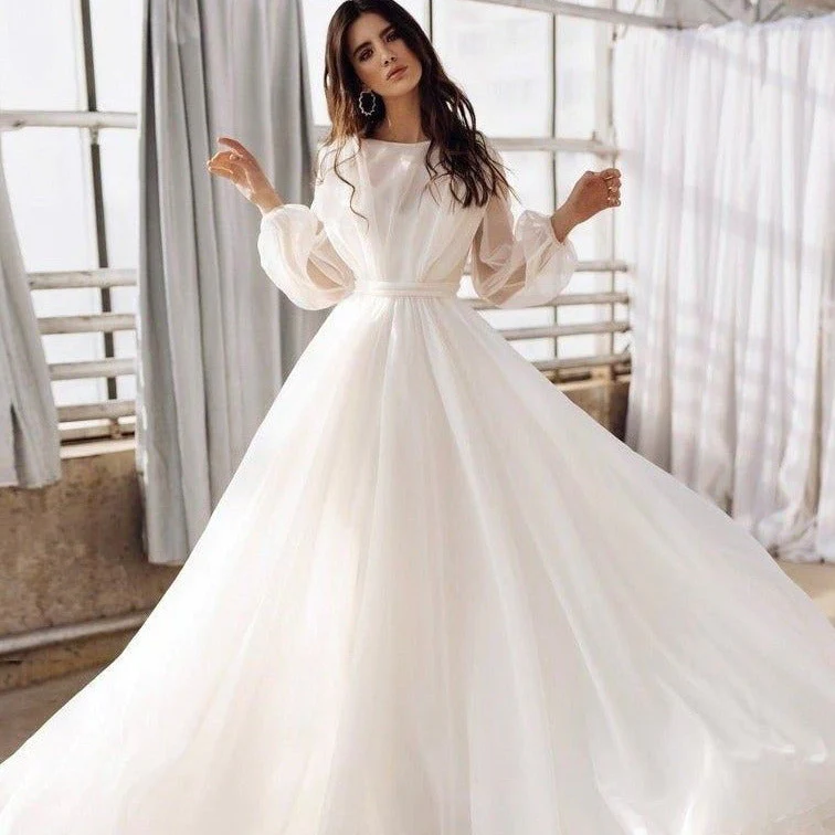 الأقمشة الفاخرة في فساتين الزفاف